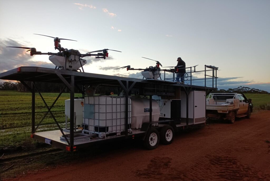 Thuringia Ag Services drone trailer with XAG drones on the roof platform in a WA paddock at dusk